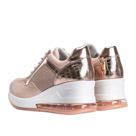 Deportivas de oro rosa en la cuña Jimena rosado 2