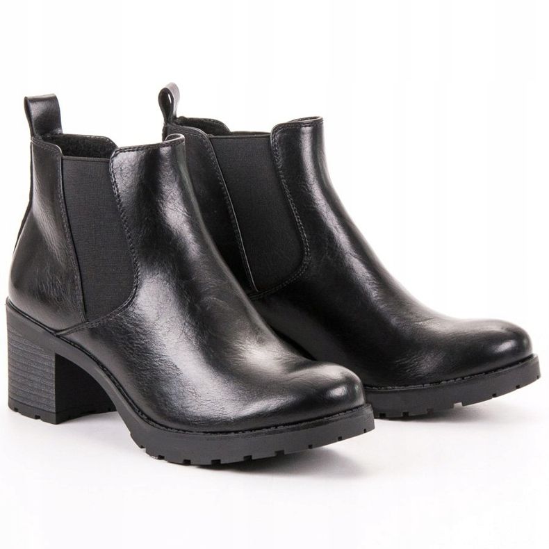 W. Potocki Botines chelsea negros en una barra 1