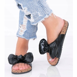 Zapatillas negras con lazo de Norris negro 1 Zapatillas negras con lazo de Norris negro 1