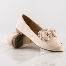 Sun Color Señorita con un arco beige 1 Sun Color Señorita con un arco beige 1