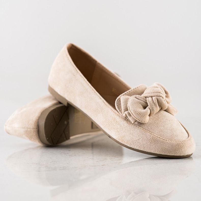 Sun Color Señorita con un arco beige 1 Sun Color Señorita con un arco beige 1