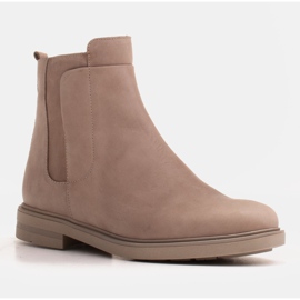 Marco Shoes Botas ligeras aisladas con fondo plano de piel natural beige 1