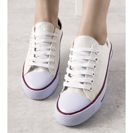 Zapatillas Guest en color crema con brillos beige 1