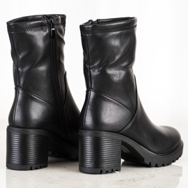 Lovery Botines altos en un poste negro 1