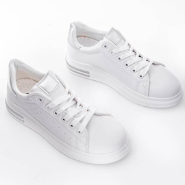 Zapatillas blancas con suela plana de nikki blanco plata 1