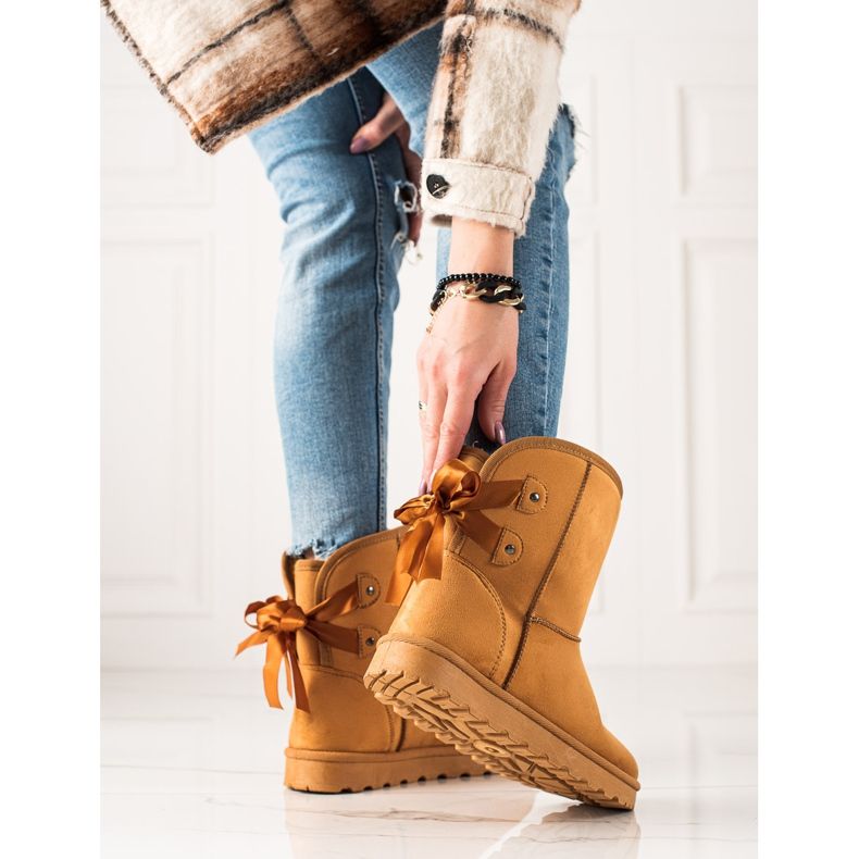 TRENDI Mukluki con un arco amarillo 2