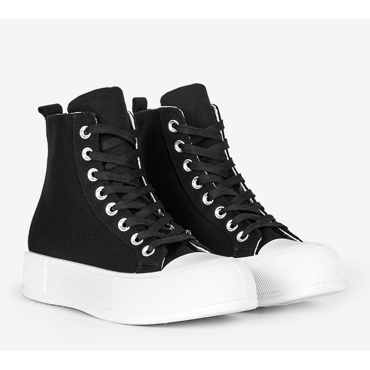 Zapatillas negras en una suela alta de Natasha. negro 1