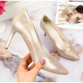 Tacones dorados brillantes Juma 1