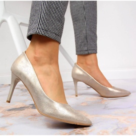 Tacones dorados brillantes Juma 4