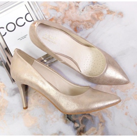 Tacones dorados brillantes Juma 2
