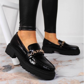 Zapatos de mujer lacados en negro con la inscripción Laura La.Fi 7
