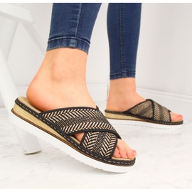 Zapatillas de mujer negras con tacón de cuña Rieker 679A5 beige marrón 4