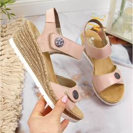 Sandalias de cuero con tacón de cuña Rieker 619B9-31 beige 1