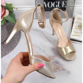 Sandalias de mujer con tacón alto dorado Sergio Leone 4