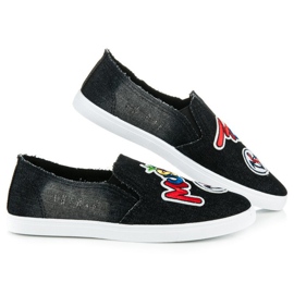 Slipons con parches negro 5