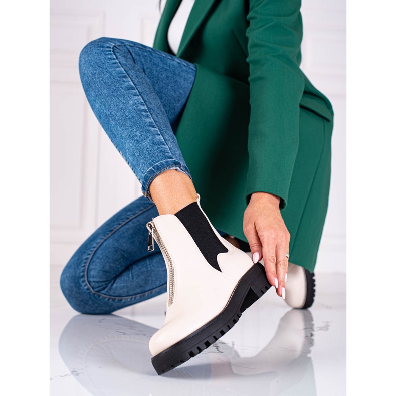 Bolsos de mujer beige con cremallera. 2