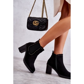 PG1 Botas de ante Cambia negras con tachuelas en un poste negro 3