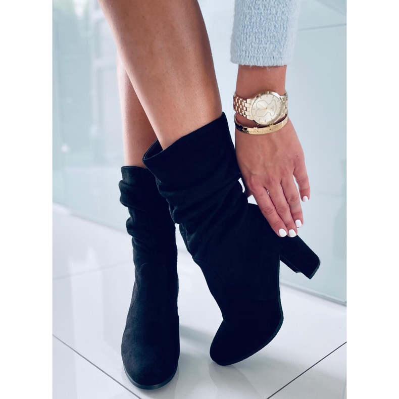 Pola Negro tacones altos 1