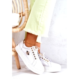 Zapatos deportivos de cuero para mujeres en la plataforma Filipczyk con circones blancos 1