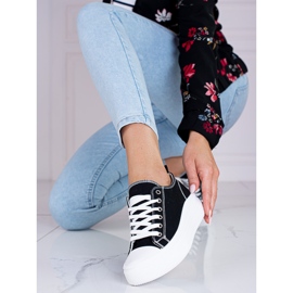 Zapatillas de mujer con cordones en blanco y negro en la plataforma Shelovet. 2