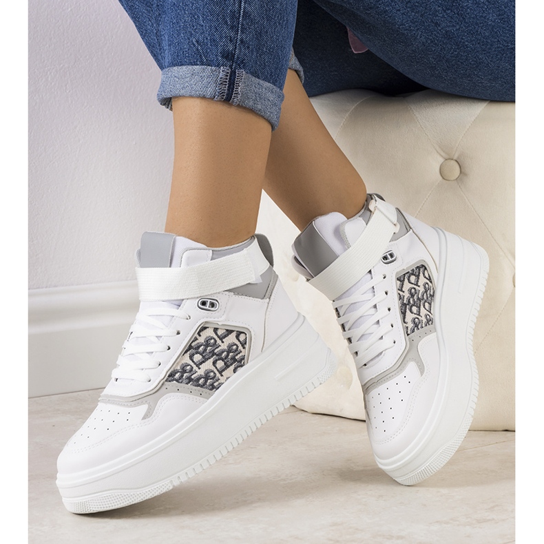 Zapatillas grises del tobillo de Adolis. 1