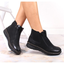 Cómodas botas de mujer con aislamiento negro Rieker negro 73355-00 8