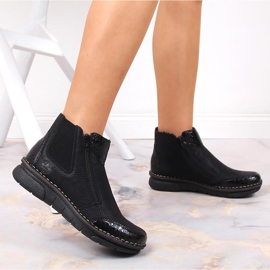 Cómodas botas de mujer con aislamiento negro Rieker negro 73355-00 9