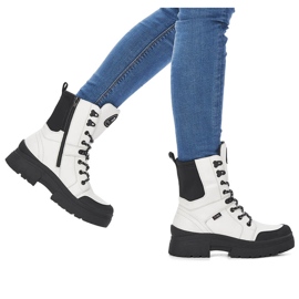 Botas de mujer impermeables en piel blanca Rieker Revolution W0374-80 blanco negro 11