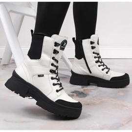 Botas de mujer impermeables en piel blanca Rieker Revolution W0374-80 blanco negro 2