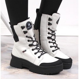 Botas de mujer impermeables en piel blanca Rieker Revolution W0374-80 blanco negro 3