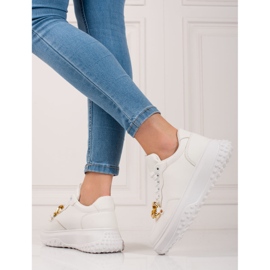 Zapatillas blancas de mujer con cadena. blanco 2