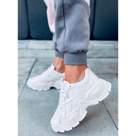 Deportivas de mujer beige con suela alta. 4