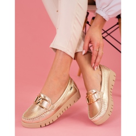 Mocasines dorados de mujer en la plataforma Shelovet 3