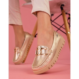 Mocasines dorados de mujer en la plataforma Shelovet 4