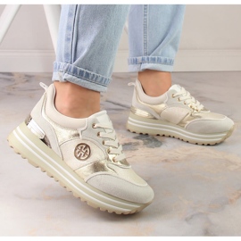 Zapatos deportivos de mujer en la plataforma dorada Potocki SZ12025 dorado 2