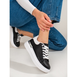 Zapatos deportivos de mujer en una plataforma alta Shelovet en blanco y negro. 3
