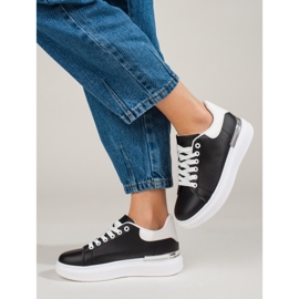 Zapatos deportivos de mujer en una plataforma alta Shelovet en blanco y negro. 2