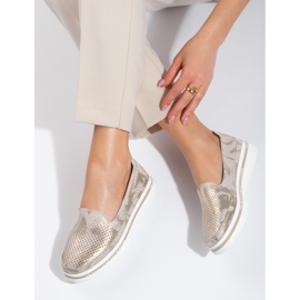 Zapatos shelovet piel calados dorados 1