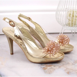 Sandalias pasadores transparentes con abalorios sabatina dorados 7
